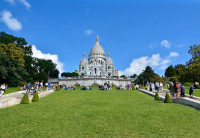 precum Basilica Sacre Coeur–dupa ce vei urca treptele ei albe vei avea parte de o vedere asupra orasului care iti va taia respiratia